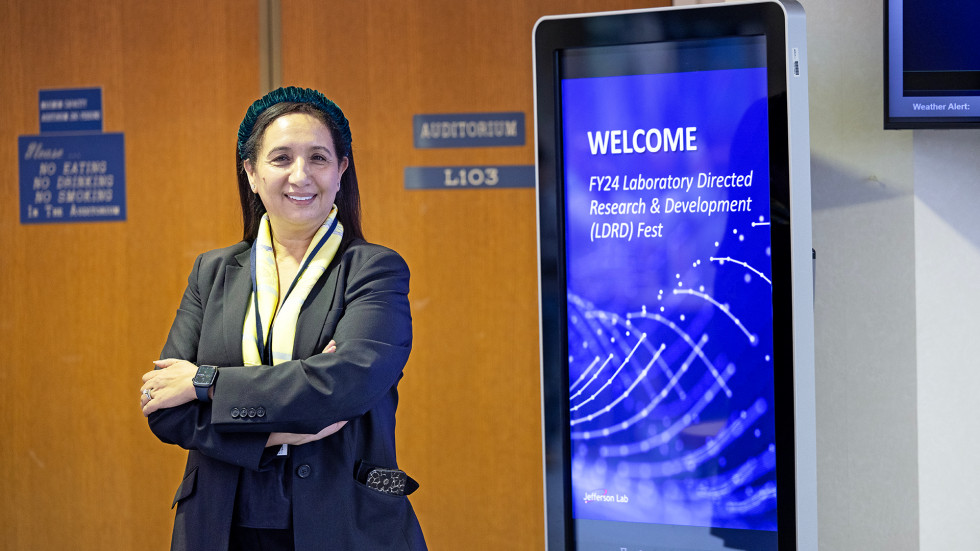 Latifa Elouadhriri with LDRD sign