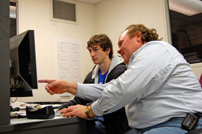 Lucas Thomeer puts finishing touches on the robot CAD design with help from JLab Staffer Jim Henry.