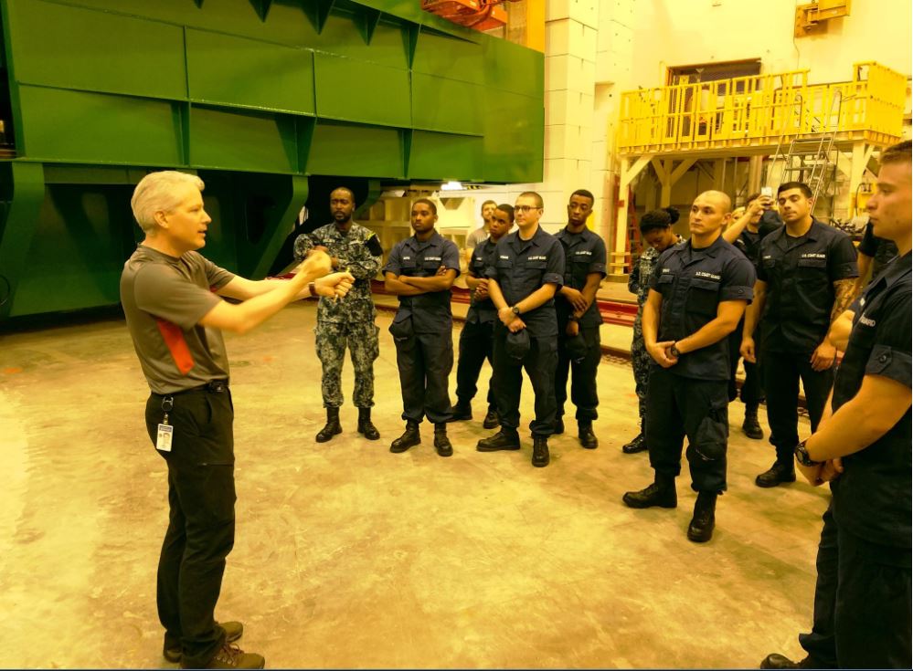 JLab scientist Brad Sawatzky speaks to members of the U.S. Coast Guard Yorktown during a tour, August 19, 2016.<br />
