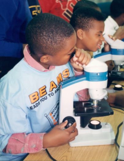 BEAMS participants peer into microscopes, 1993.