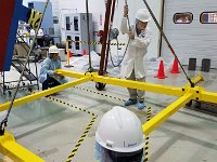 Mindy Leffel and Ed Folts using gantry to lift stiffening tool 2017-08-21