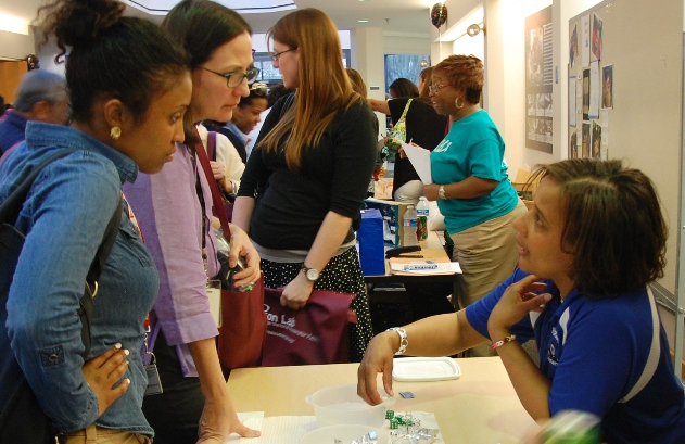 Teachers discuss an activity at Teacher Night 2018