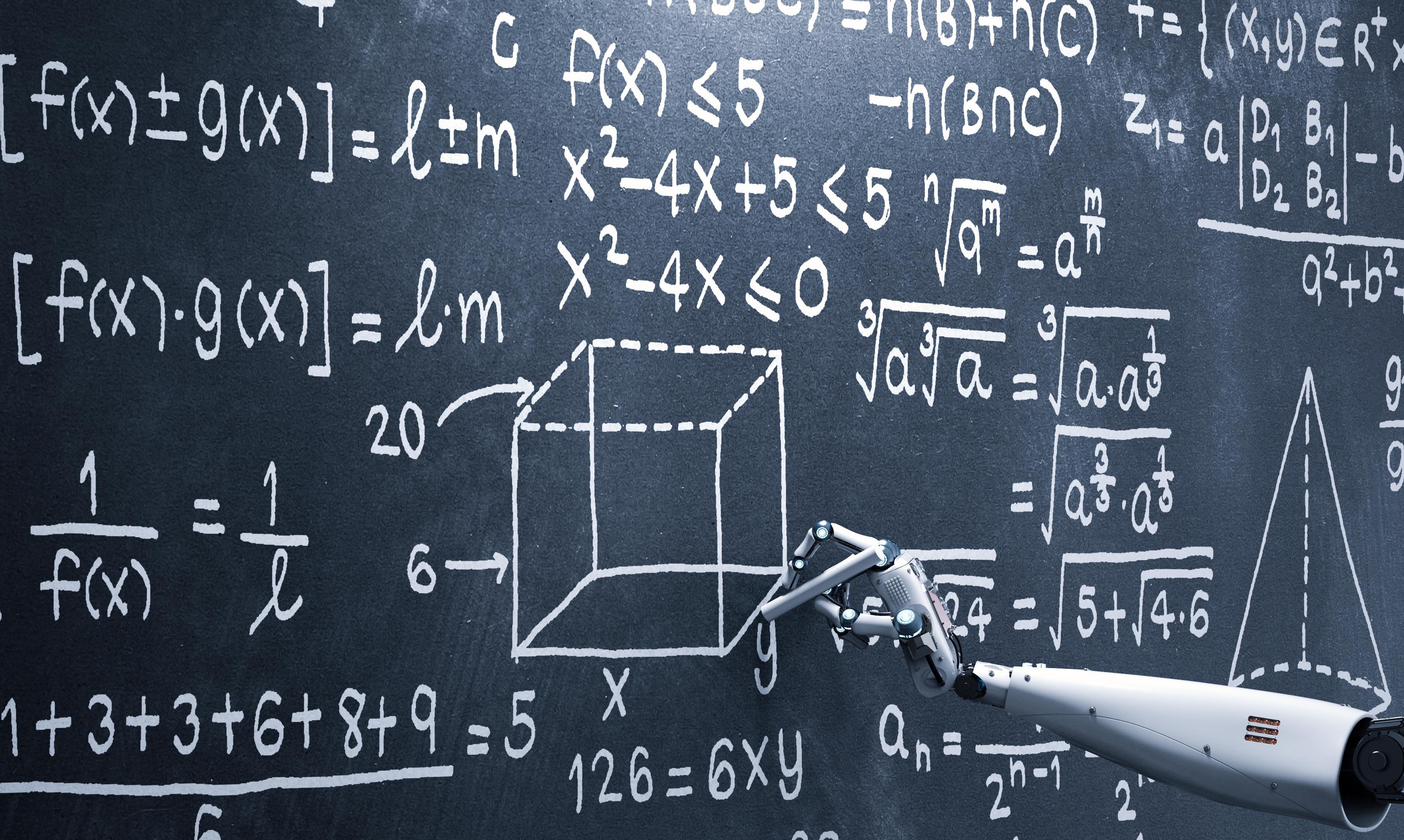 robot arm writes equations on a chalkboard