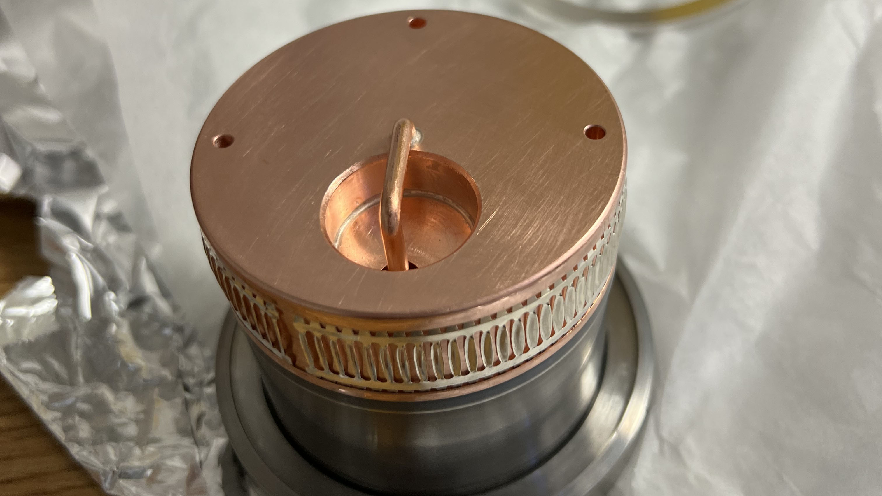 A remade chopper coupler - a copper cylinder attached to a stainless steel joint - completed