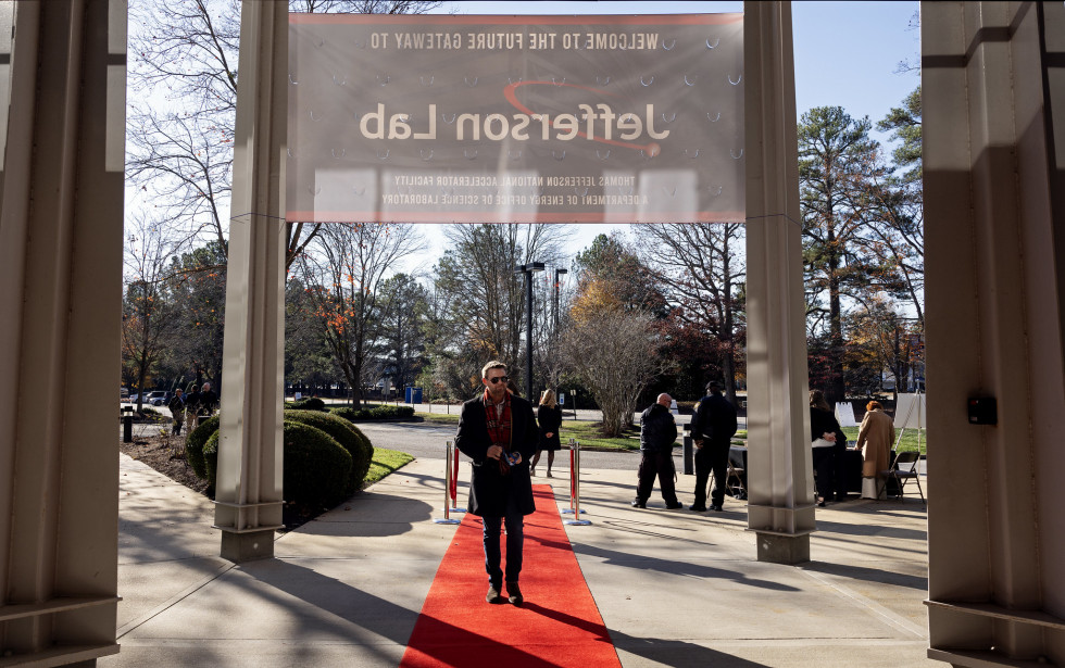 Visitor walks down the red carpet toward ARC entrance