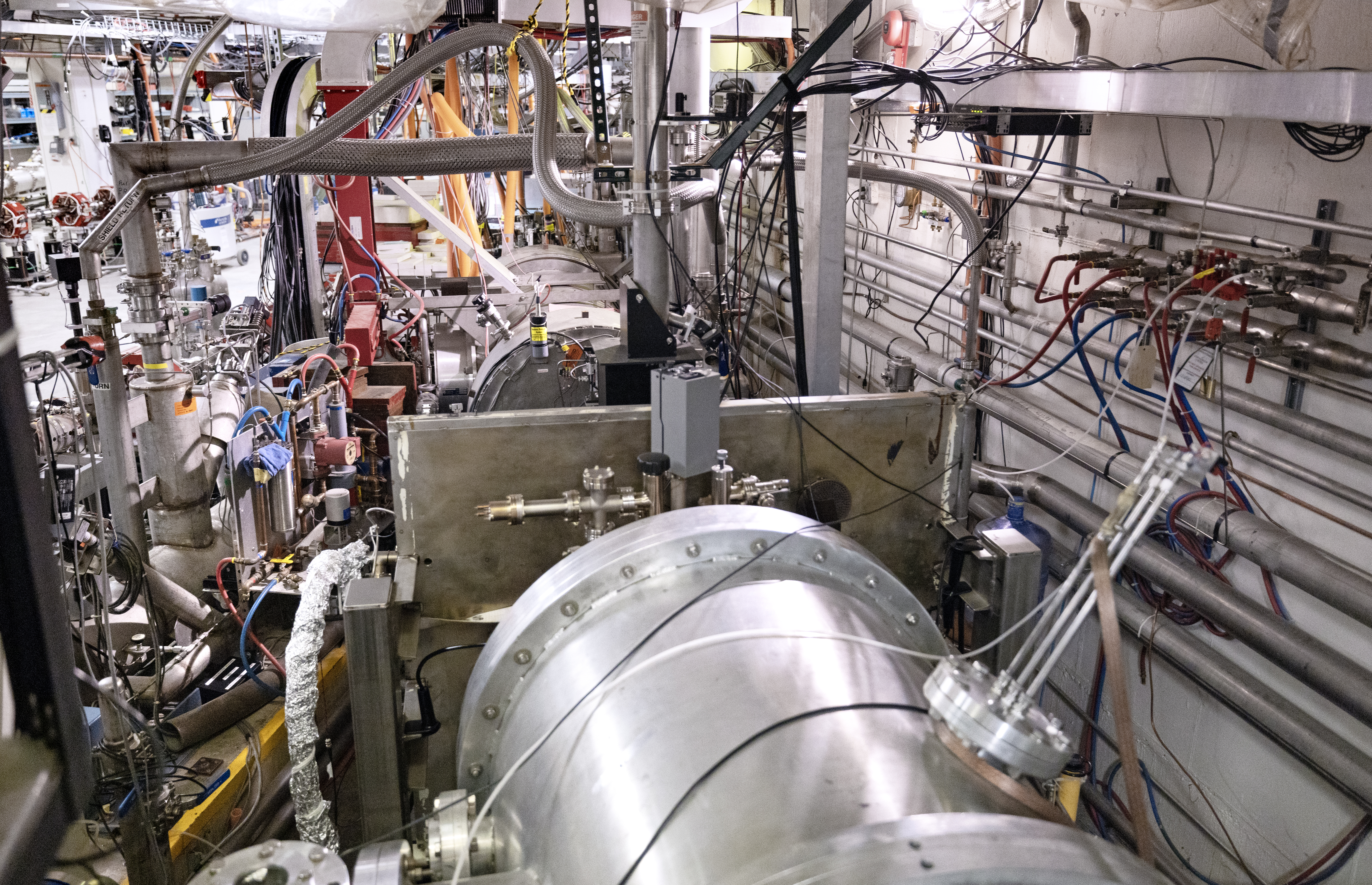 Shown is an overall photograph of the electron gun and the superconducting cryogenics unit inside the Low Energy Recirculator Facility at Jefferson Lab in Newport News on Thursday, Sept. 14, 2023. (Aileen Devlin | Jefferson Lab)