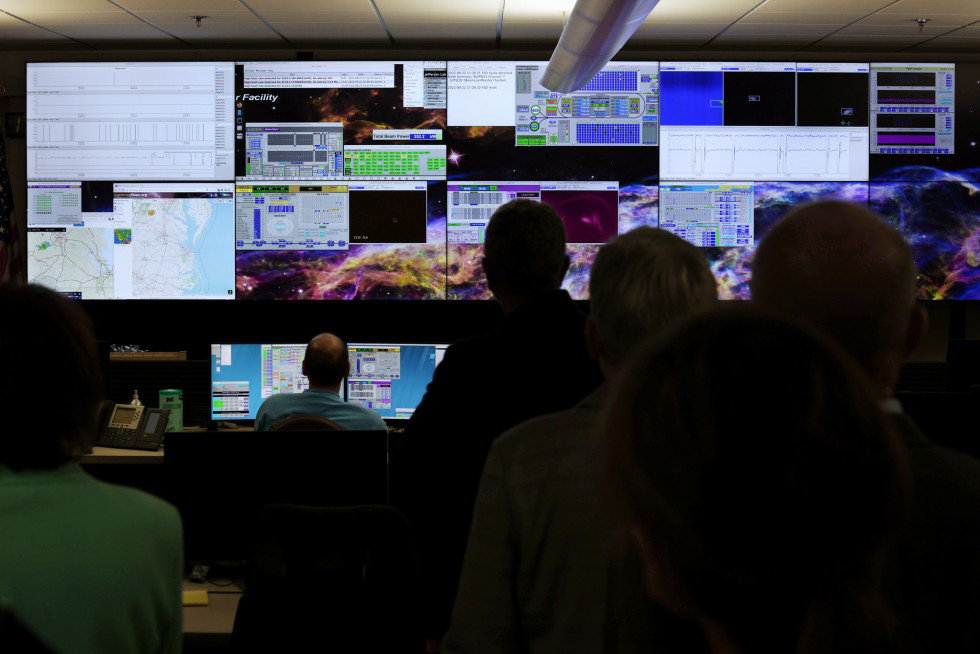 Members of the Virginia Tech Board of Visitors visit the Machine Control Center during a tour of the Department of Energy's Thomas Jefferson National Accelerator Facility (Jefferson Lab) on Monday, Aug. 22, 2022.