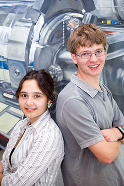 Heidi Baumgartner and Peter Heuer, The Cyclotron Kids, take a break from their efforts to build a cyclotron at Jefferson Lab.