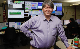 Todd Satogata shown in the CEBAF control room