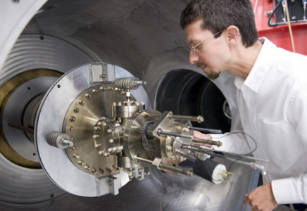 Inspecting an injector assembly at Jefferson Lab's LERF