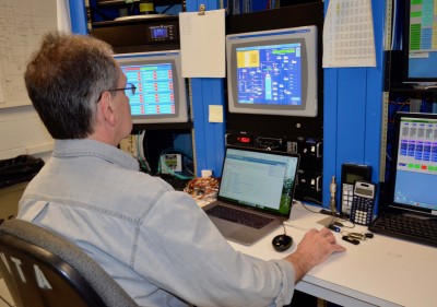 Control Room of Vertical Test Area, showing Pete Kushnick at the controls.
