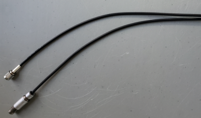 portion of a newly fabricated cable with two terminals shown