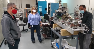 Shaun Gregory, Marcy Stutzman, Phil Adderley working on components