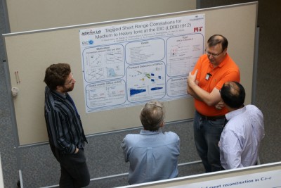 A principal investigator presents a poster on the results of his LDRD project