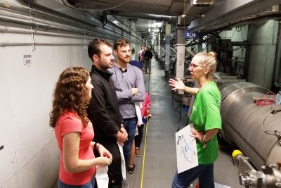 Members of the JLab community interact with the public at the Open House in 2018 - CEBAF Accelerator Tunnel